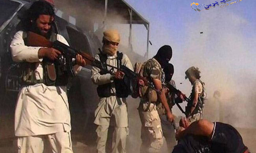 عصابات داعش تقتل عالم اثار سوري وتعلق جثته في مكان اثري