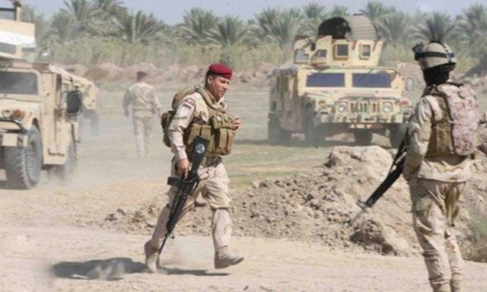 القوات الامنية تحرر معمل اسمنت كبيسة وترفع العلم العراقي