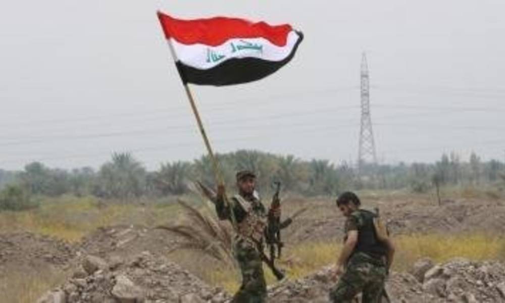 جهاز مكافحة الإرهاب يسيطر على قائممقامية هيت ويرفع العلم العراقي فوق مبناه