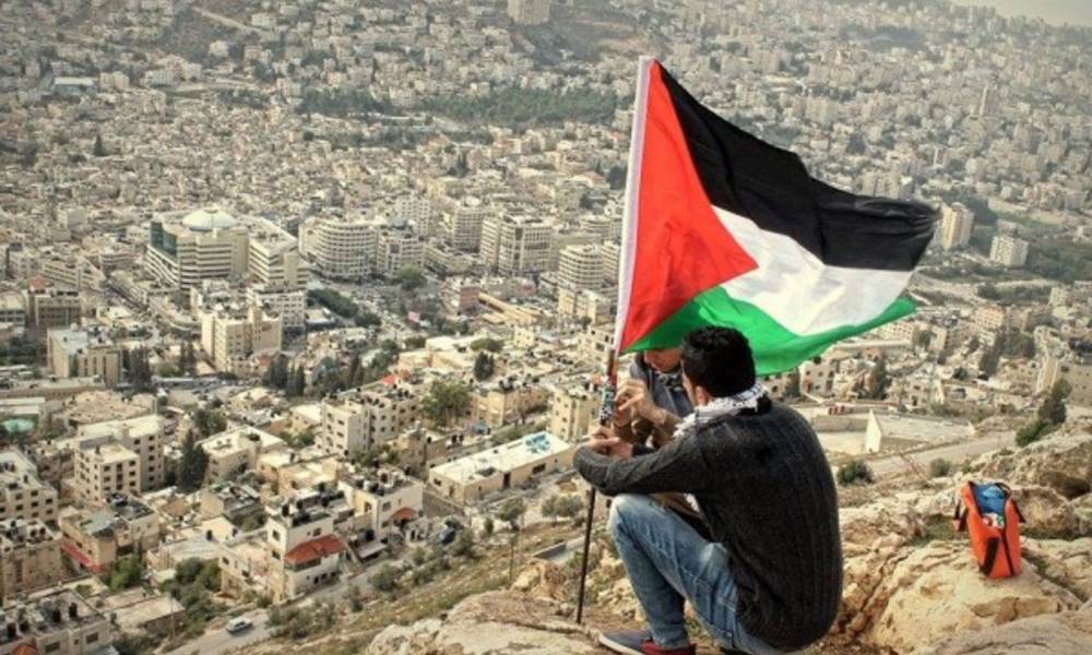 بالصور.. فلسطين تفتتح نصب وشارع بأسم الرئيس العراقي الاسبق صدام حسين !
