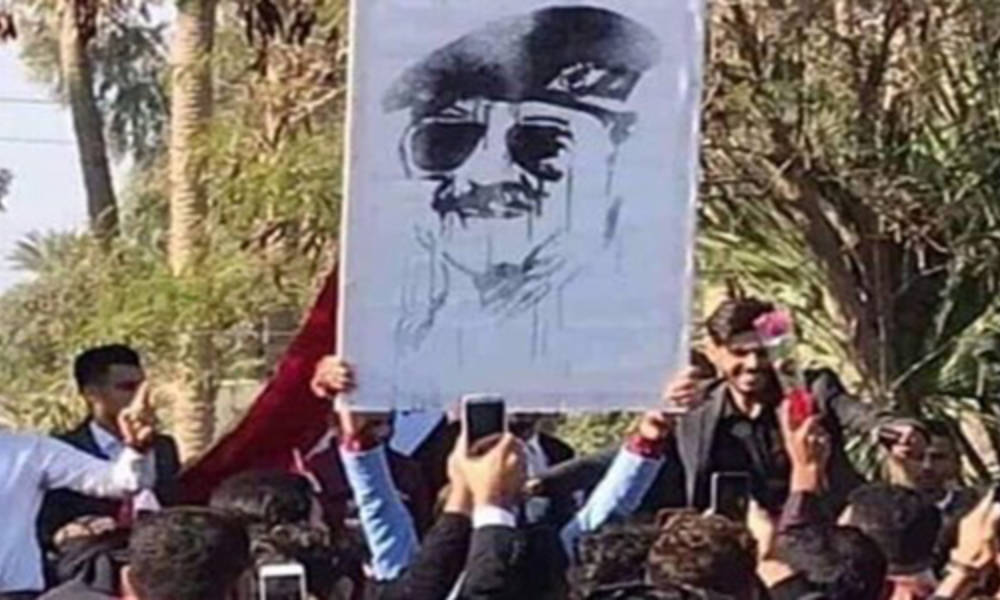 بالفيديو .. رفع صورة "صدام حسين" في جامعة الانبار