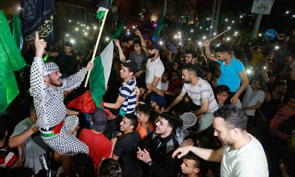 #بالفيديـــــو #لبنان ???????? احتفالات كبيرة في الضاحية الجنوبية في لبنان بمناسبة انتصار المقاومة الفلسطينية في غزة..