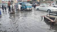 بالصور:المياه تغمر شوارع النجف إثر هطول أمطار غزيرة