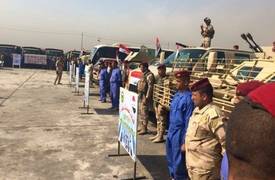 الدفاع: المدرعات وناقلات الجند التي عُرضت بمطار المثنى ستشارك ايضا في معارك الموصل