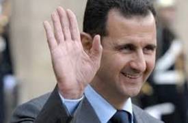 صورة الرئيس السوري بشار الاسد في فرنسا