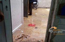 شاهد بالصور... مستشفى اليرموك تغرق بـ"مياه المجاري"