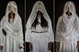 الهاربات الايزيديات من عبودية داعش يروينَ معاناتهن بفساتين الزفاف