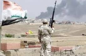 الاعلام الحربي يعلن تحرير الزنكورة ورفع العلم العراقي فوق احد مبانيها