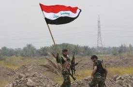 جهاز مكافحة الإرهاب يسيطر على قائممقامية هيت ويرفع العلم العراقي فوق مبناه