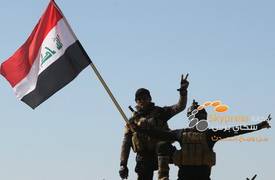 القوات الامنية تحرر قرية الشيحة وترفع العلم العراقي فيها