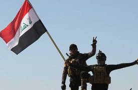 الشرطة الاتحادية ترفع العلم العراقي فوق مركز شرطة الخالدية