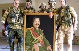 بالصور .. "جنود امريكان" في قصور "صدام حسين" في الذكرى الـ 15 لحرب العراق