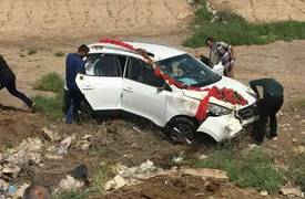 بالصور .. حادث مؤسف لـ"سيارة عرس" على الطريق الدولي لجنوب "بغداد"