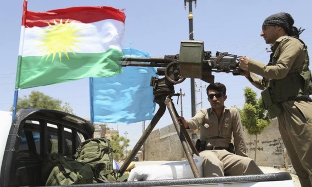 البيشمركة تنزل الاعلام العراقية وترفع علم كردستان في الطوز