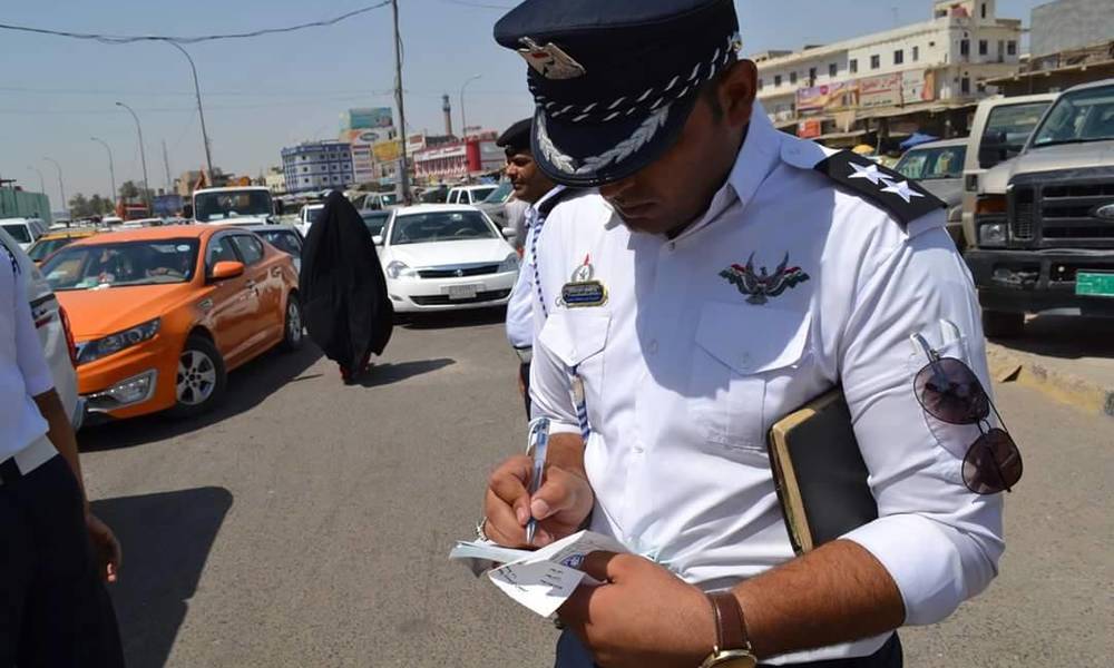 بالفيديو .. اعتداء جديد على منتسب في المرور بــ "الضرب" من قبل قوات الشغب