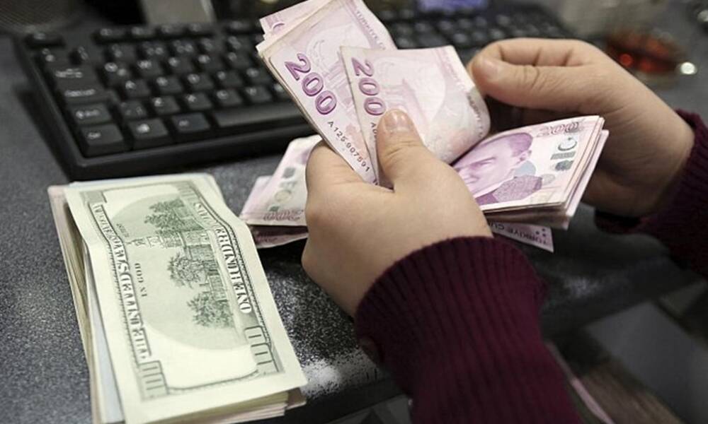 انهيار  العملة التركية مقابل الدولار