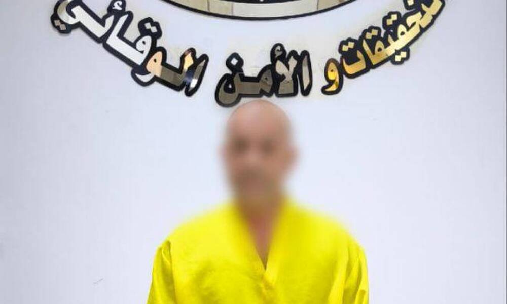 أمن الحشد يعتقل متهماً بعد اعتدائة على صورة لقادة النصر