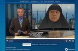 جدل حول صورة المستشارة الألمانية بـ"الحجاب" على التلفزيون الألماني