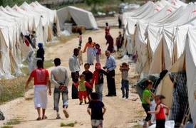 الهجرة تجهز مخيمات النازحين بمضخات سحب المياه الراكدة