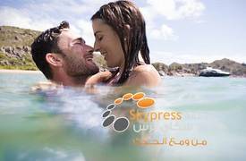 بالصور.. جلسة تصوير لعروسين أسفل المياه والضحية فستان الزفاف