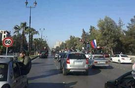 بالصور .. "السوريون" يهتفون بالاعلام "الروسية" ضد العدوان الثلاثي