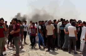 متظاهرو الناصرية يغلقون الطريق الدولي إلى بغداد