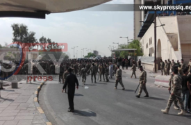 بالصورة .. القوات الأمنية تقطع جسر الجمهورية في بغداد امام المتظاهرين