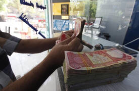 تراجع مخيف في سعر صرف الدينار العراقي مقابل العملة الأمريكية