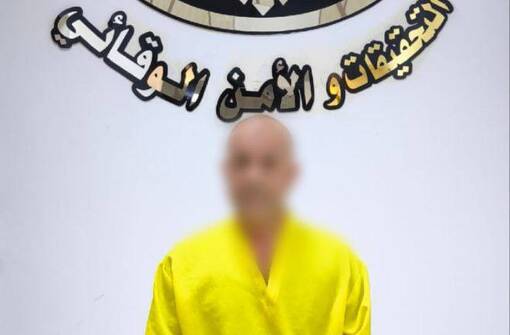 أمن الحشد يعتقل متهماً بعد اعتدائة على صورة لقادة النصر